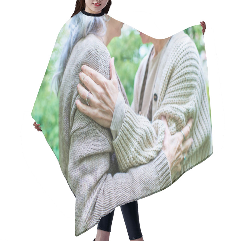 Personality  A Middle-aged Lesbian Couple Embraces Each Other Warmly While Wearing Cardigans, Surrounded By Lush Green Trees. Hair Cutting Cape