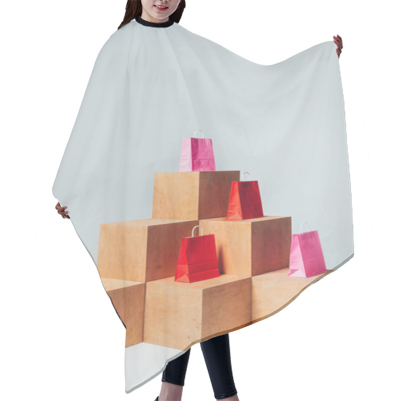 Personality  Red And Pink Shopping Bags On Wooden Cubes, Summer Sale Concept Hair Cutting Cape