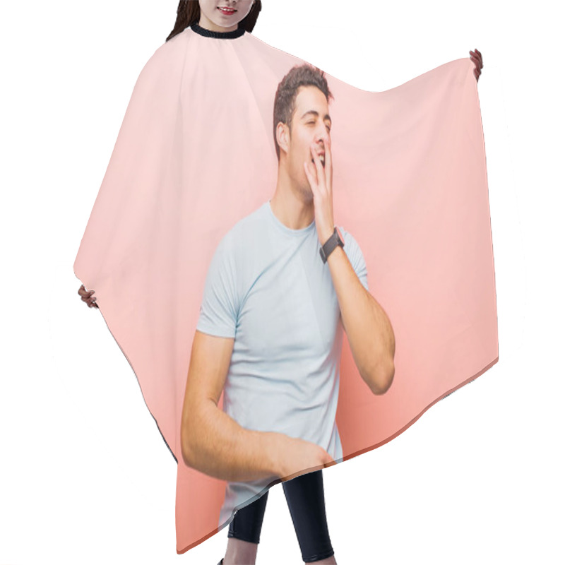 Personality  Young Arabian Man Yawning Lazily Early In The Morning, Waking And Looking Sleepy, Tired And Bored Against Pink Wall Hair Cutting Cape