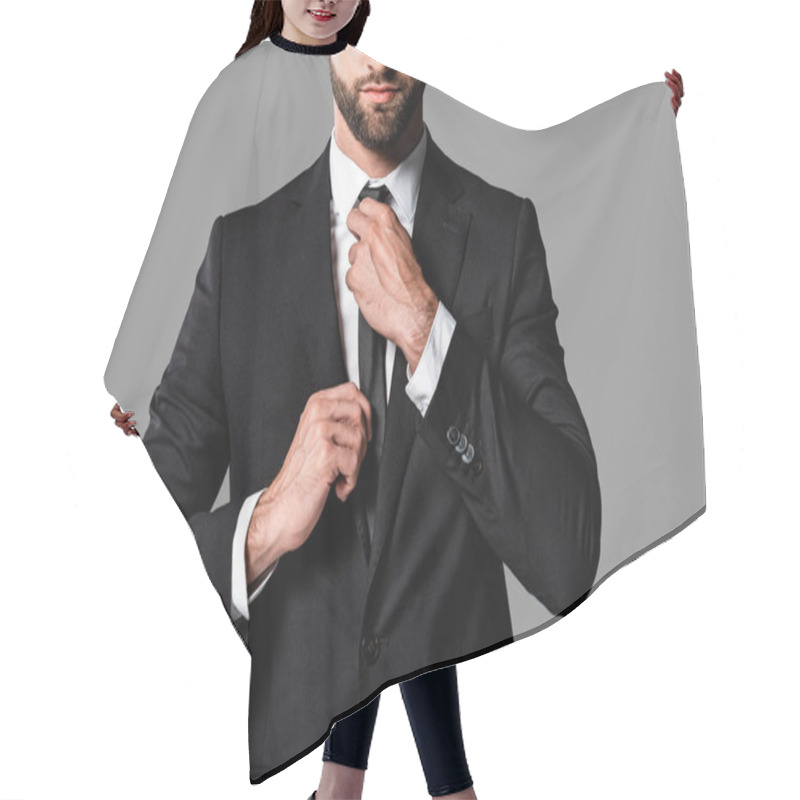 Personality  Cropped View Of Stylish Handsome Businessman In Black Suit Fixing Tie Isolated On Grey Hair Cutting Cape