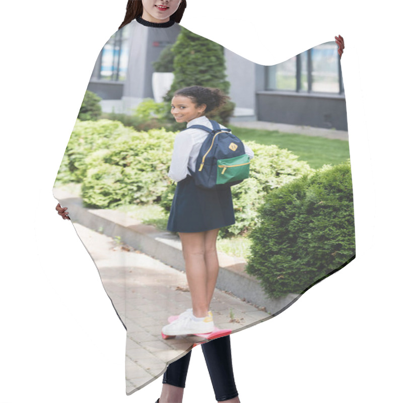 Personality  Smiling African American Schoolgirl With Backpack Riding Penny Board Outdoors Hair Cutting Cape