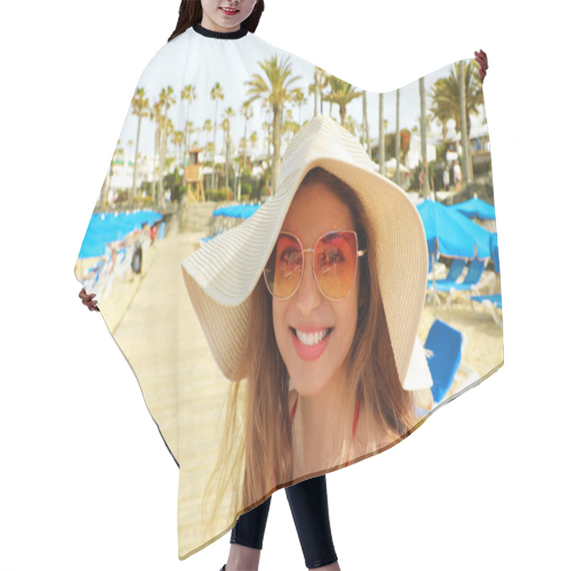 Personality  Smiling Young Woman With Straw Hat And Sunglasses On The Beach Looking At The Camera. Happy Beautiful Girl With Deck Chairs, Umbrellas And Palm Trees, Typical Tropical Scenery At Canary Islands, Spain Hair Cutting Cape