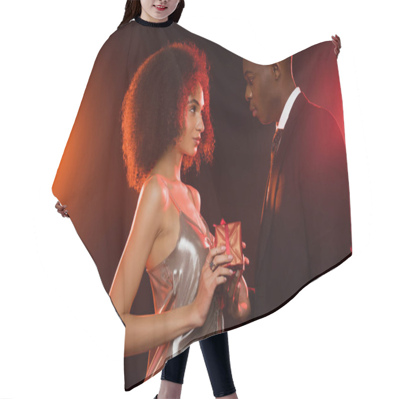 Personality  Side View Of African American Man Giving Present To Woman In Dress On Black Hair Cutting Cape