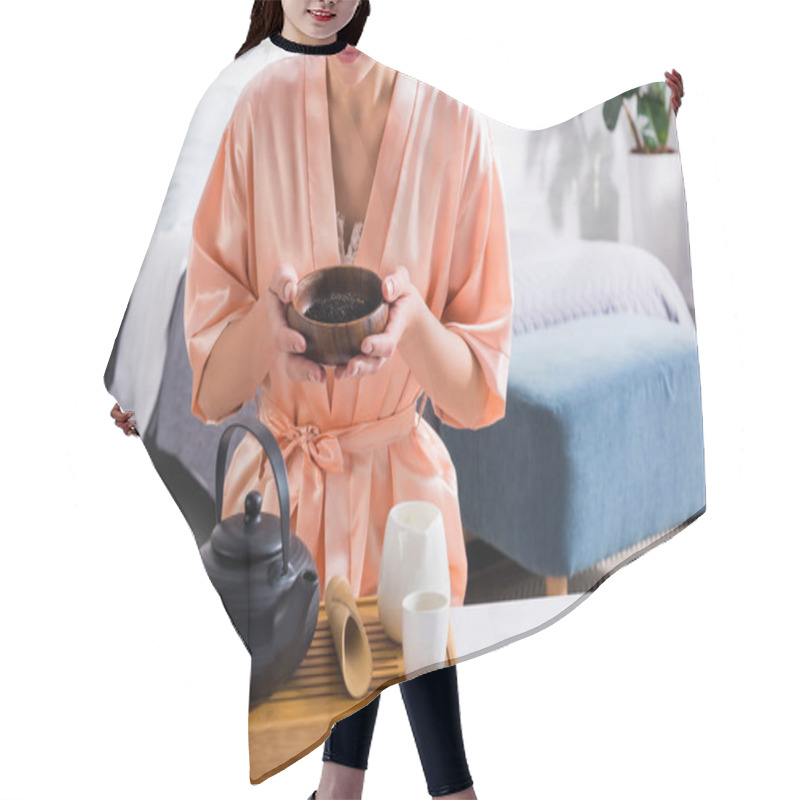 Personality  Cropped Shot Of Woman Holding Wooden Bowl With Black Tea In Hands In Morning At Home Hair Cutting Cape