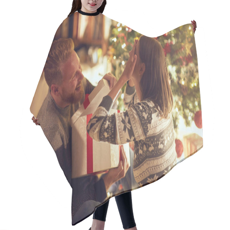 Personality  Romantic Surprise Holiday  Cheerful Young Couple With Gift Enjoying Together On Christmas Eve Hair Cutting Cape