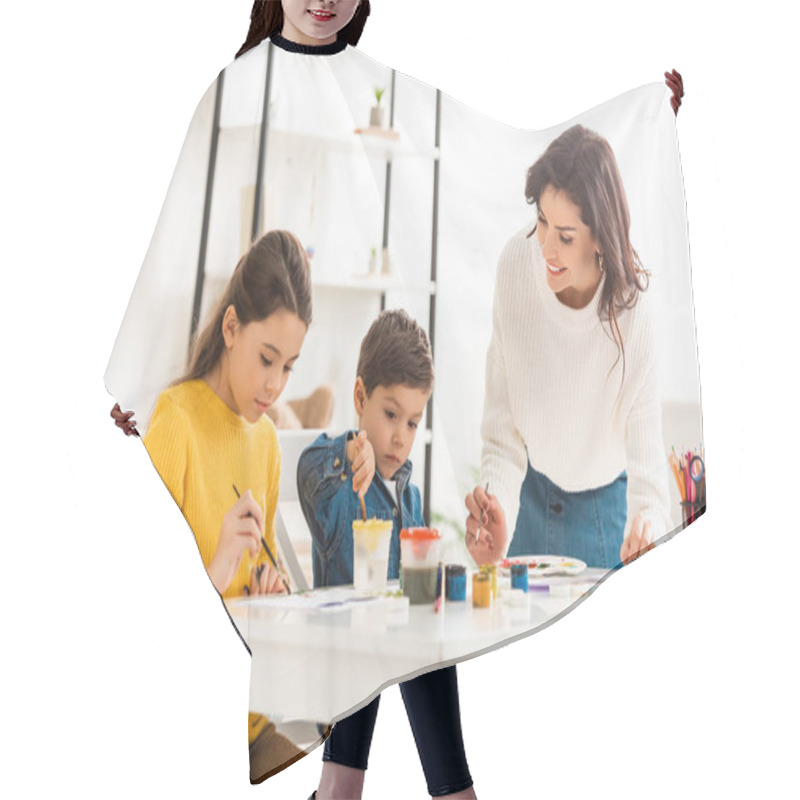 Personality  Happy Woman Standing Near Table And Drawing With Paints Together With Children Hair Cutting Cape