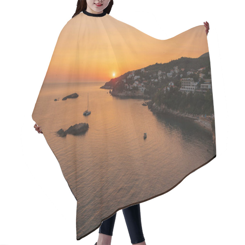 Personality  A Serene Sunset Over A Coastal Town With A Calm Sea And Anchored Boats. Hair Cutting Cape