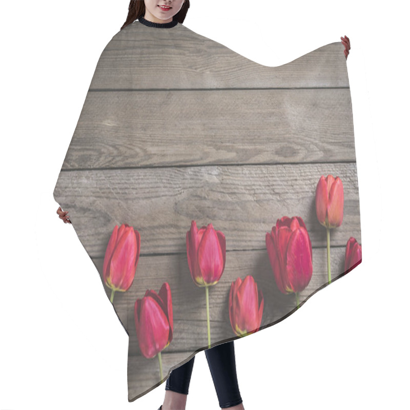 Personality  Row Of Red Tulips On Wooden Background With Space For Text, Message. Mother's Day, Hello Spring Concept. Card. Flat Lay. Top View. Rustic Style. Toned.  Hair Cutting Cape