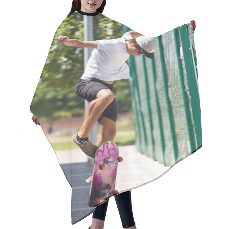 Personality  Handsome Young Man Skateboarding In The Street. Hair Cutting Cape