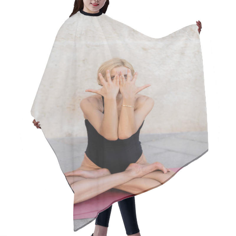 Personality  Woman In Bodysuit Sitting In Lotus Pose On Yoga Mat Outdoors  Hair Cutting Cape