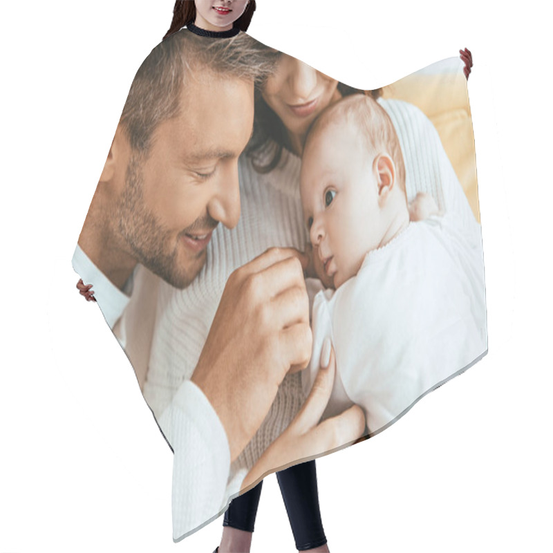 Personality  Happy Father Touching Adorable Little Daughter Lying On Mothers Hands Hair Cutting Cape