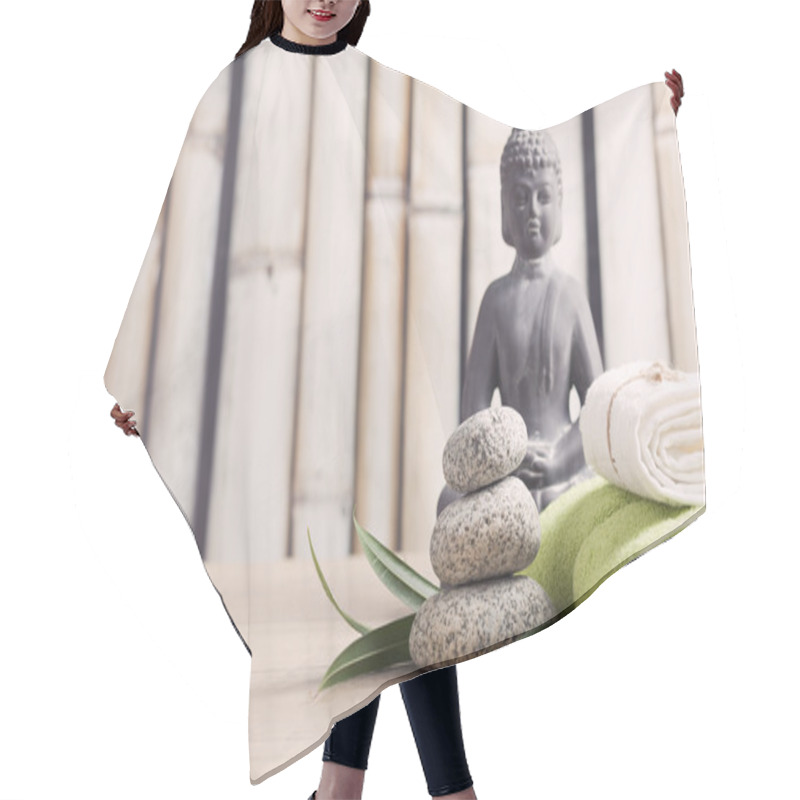 Personality  Wellness And Spa Concept With Buddha Figure Hair Cutting Cape