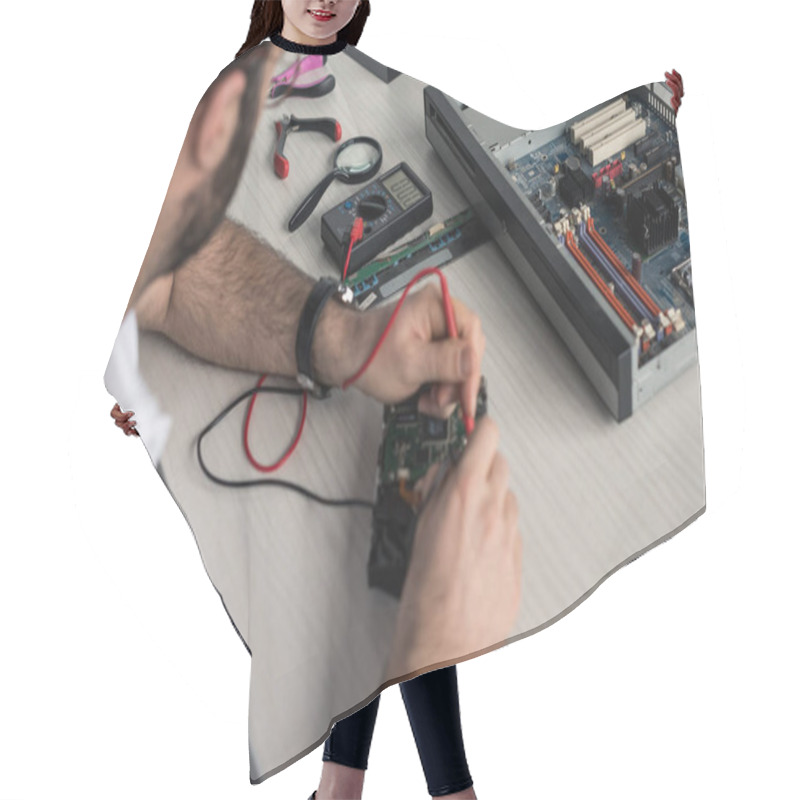 Personality  Cropped Image Of Man Using Multimeter While Testing Hard Disk Drive     Hair Cutting Cape