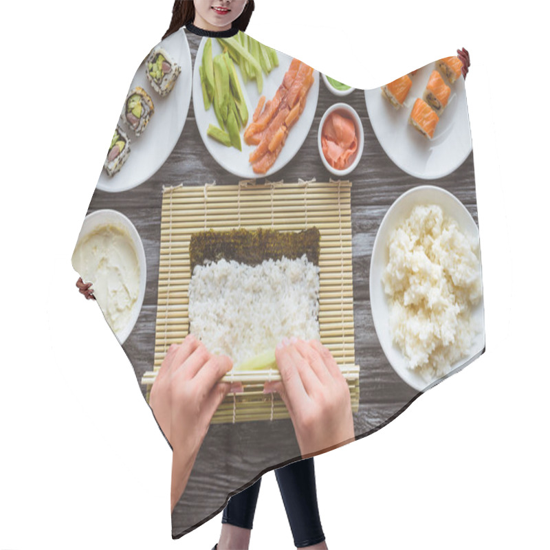 Personality  Cropped Shot Of Person Preparing Sushi With Rice And Nori  Hair Cutting Cape