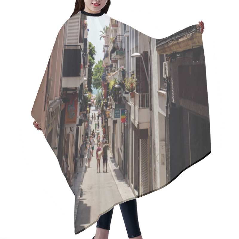 Personality  CATALONIA, SPAIN - APRIL 30, 2020: People Walking On Urban Street Near Houses With Plants On Balcony Hair Cutting Cape