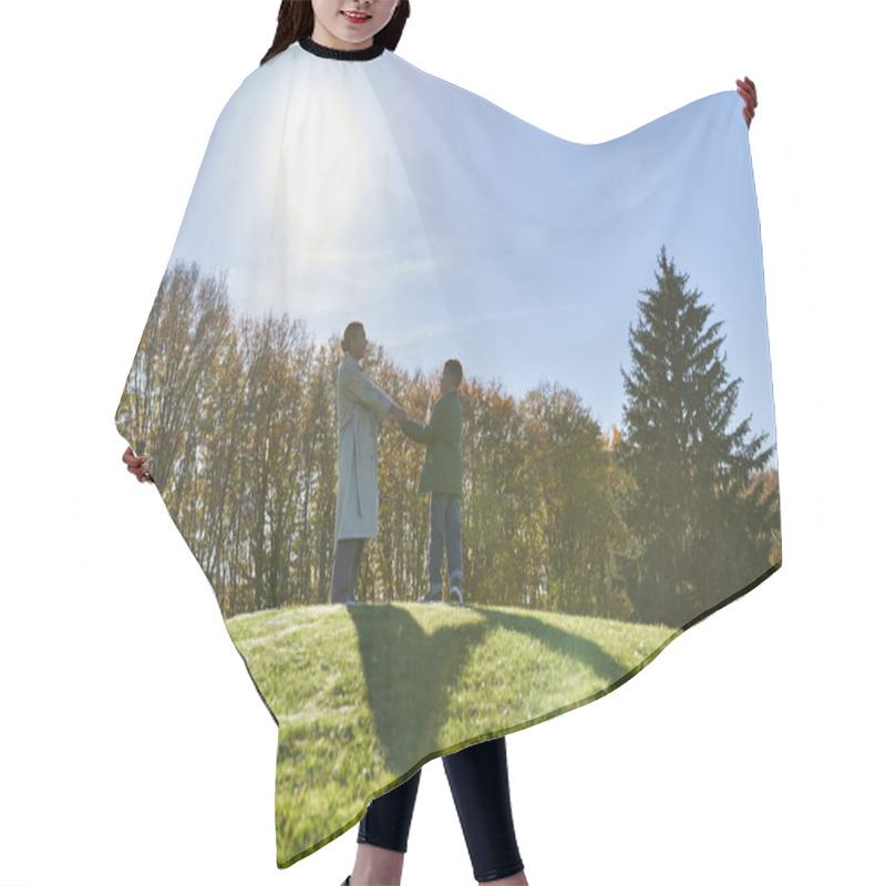 Personality  Mother And Child Holding Hands, Standing On Green Hill In Park, Autumn Foliage, African American Hair Cutting Cape