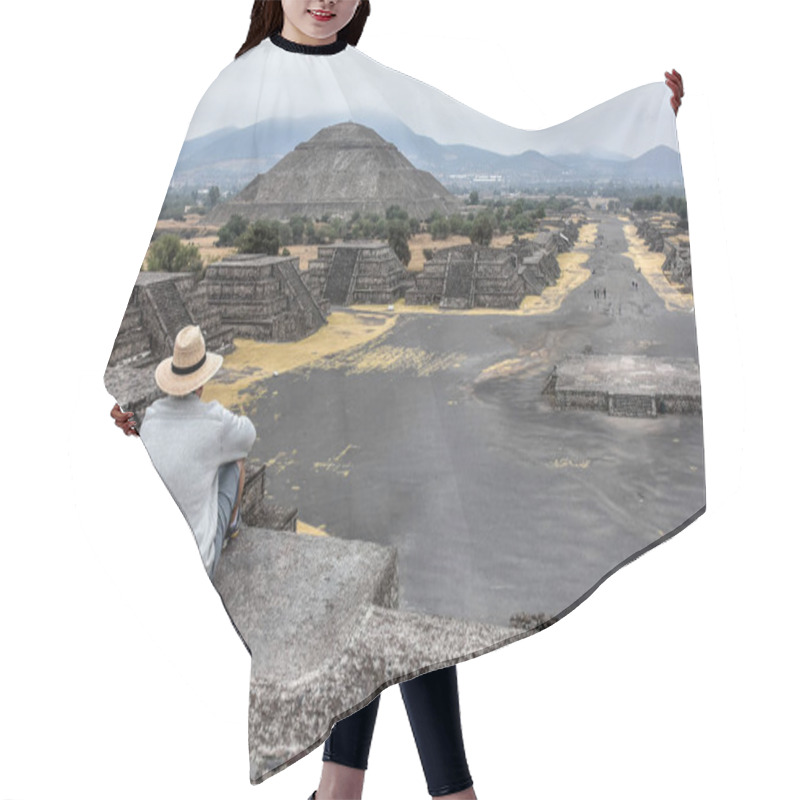 Personality  Tourist Admires The Ruins Of Teotihuacan, Mexico's Famous Aztec Pyramids. Man Sitting Down Looking Out Over Ancient City Hair Cutting Cape