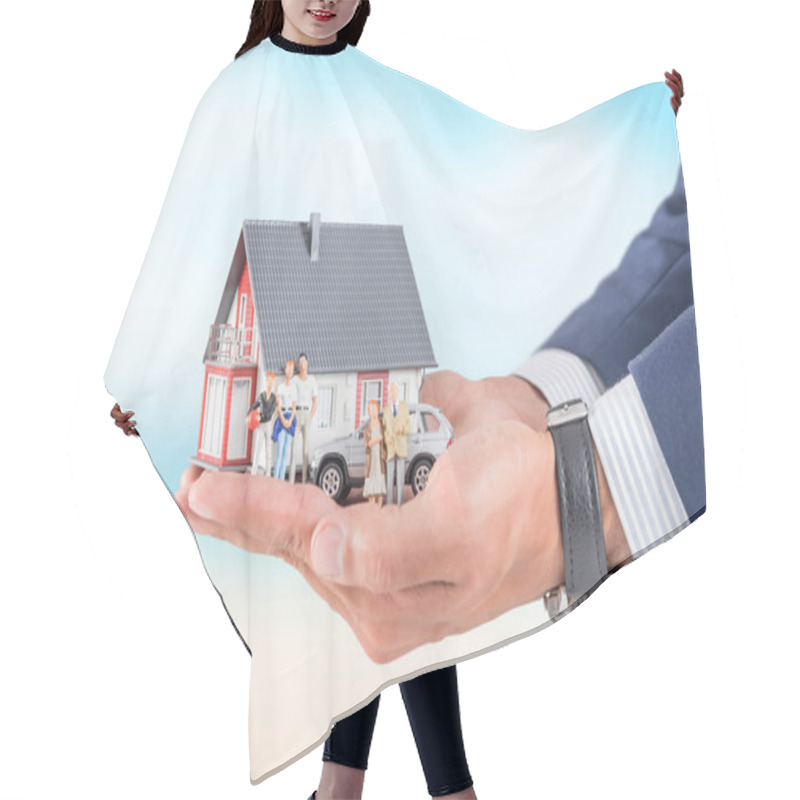 Personality  Insurance Agent With House Toy, Safety Insurance Concept. Hair Cutting Cape