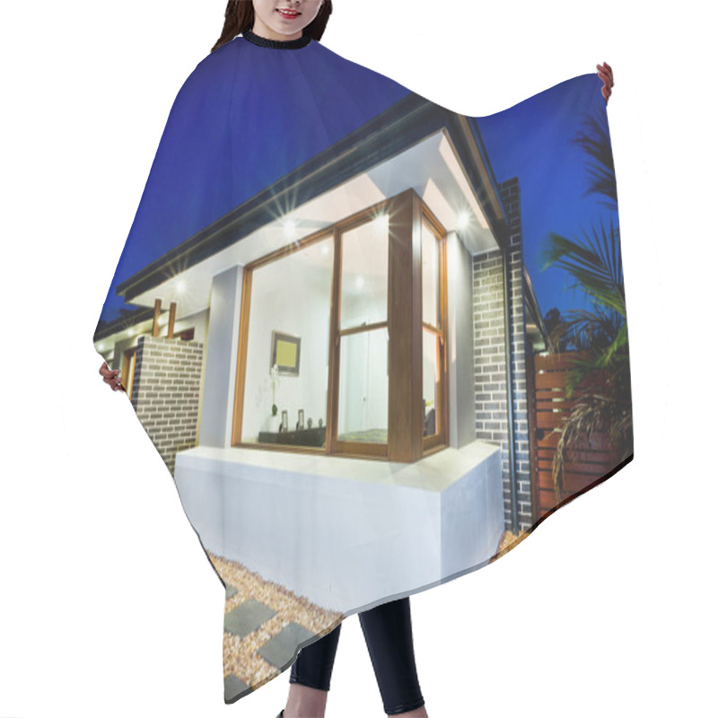 Personality  Front view of modern and luxury house exterior hair cutting cape