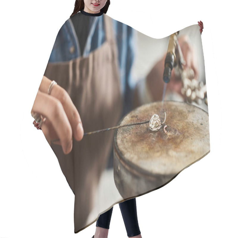 Personality  A Skilled Artisan Meticulously Shapes A Delicate Piece Of Jewelry In A Well Lit Workshop. Hair Cutting Cape