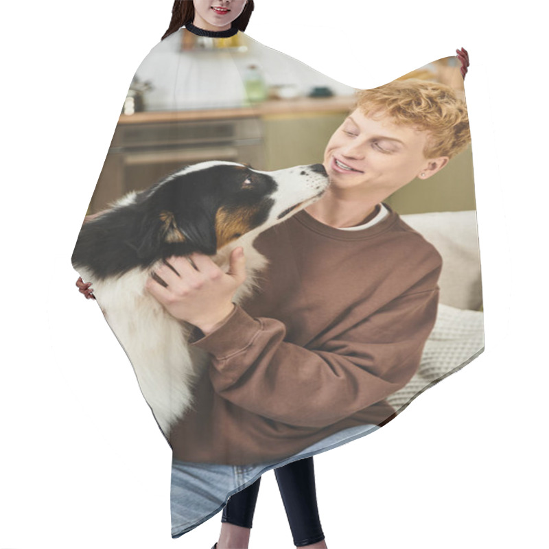 Personality  A Young Redhead Shares Playful Moments With His Adorable Australian Shepherd In A Modern Apartment. Hair Cutting Cape