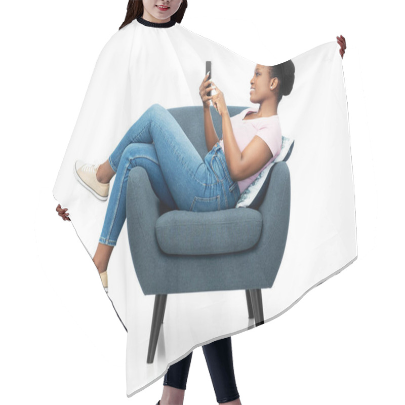 Personality  African American Woman With Smartphone In Armchair Hair Cutting Cape