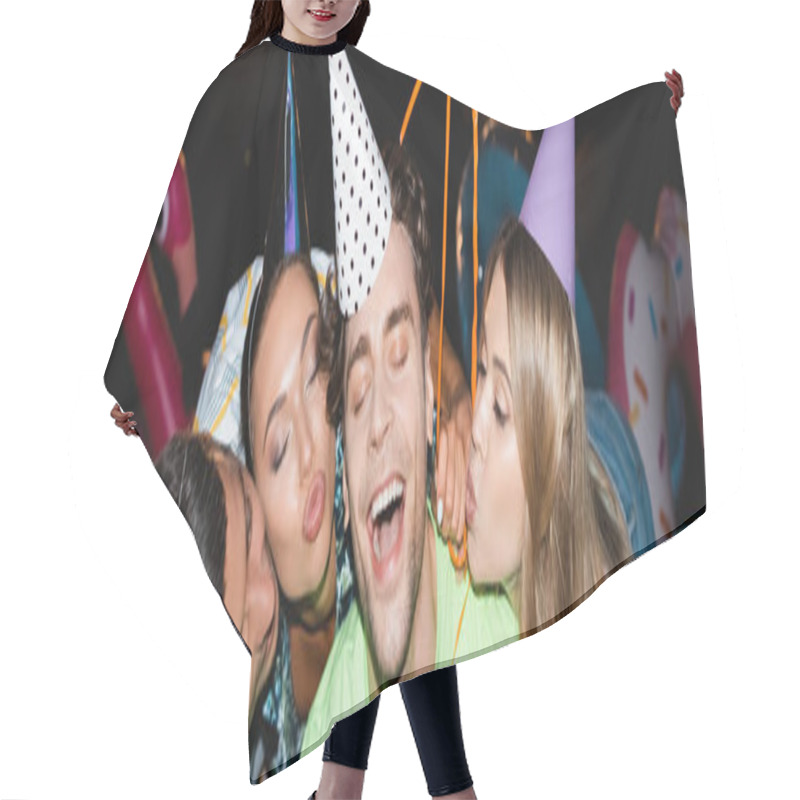 Personality  Panoramic Crop Of Young Friends Kissing Man In Party Cap Near Balloons At Night  Hair Cutting Cape