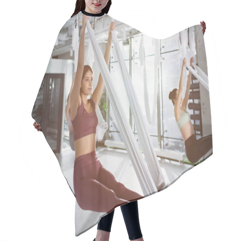 Personality  Group Of Young Sportive Women Practicing Fly Yoga In Sports Center Hair Cutting Cape