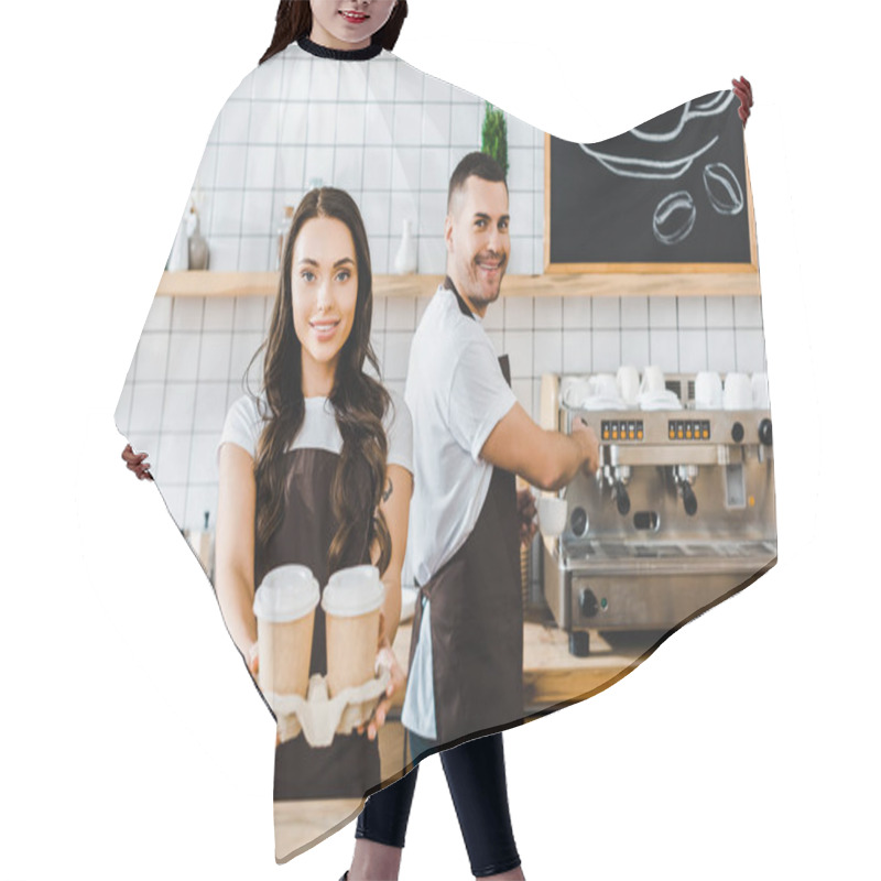 Personality  Brunette Cashier Standing And Holding Paper Cups Wile Man Making Coffee In Coffee House Hair Cutting Cape