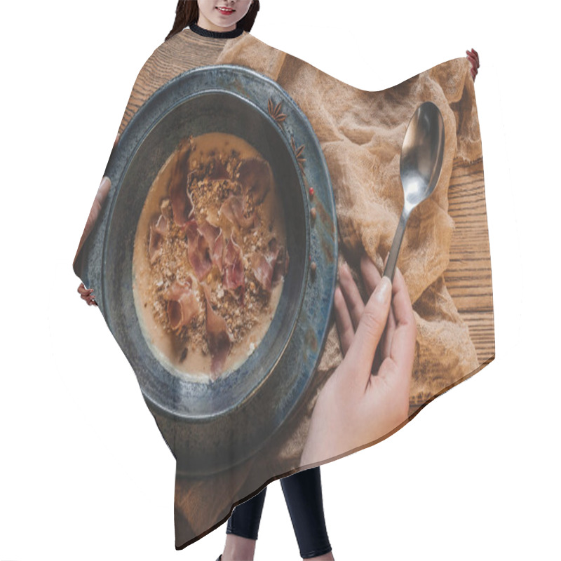 Personality  Cropped Shot Of Person Holding Spoon And Eating Delicious Cream Soup With Jamon Hair Cutting Cape