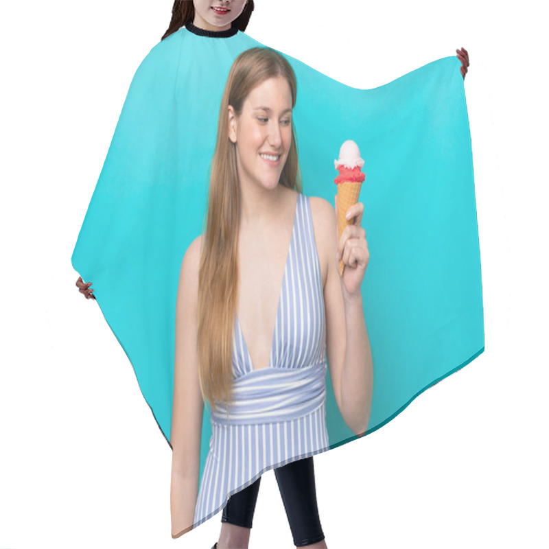 Personality  Young Caucasian Woman In Swimsuit Eating Ice Cream Isolated On Blue Background With Happy Expression Hair Cutting Cape