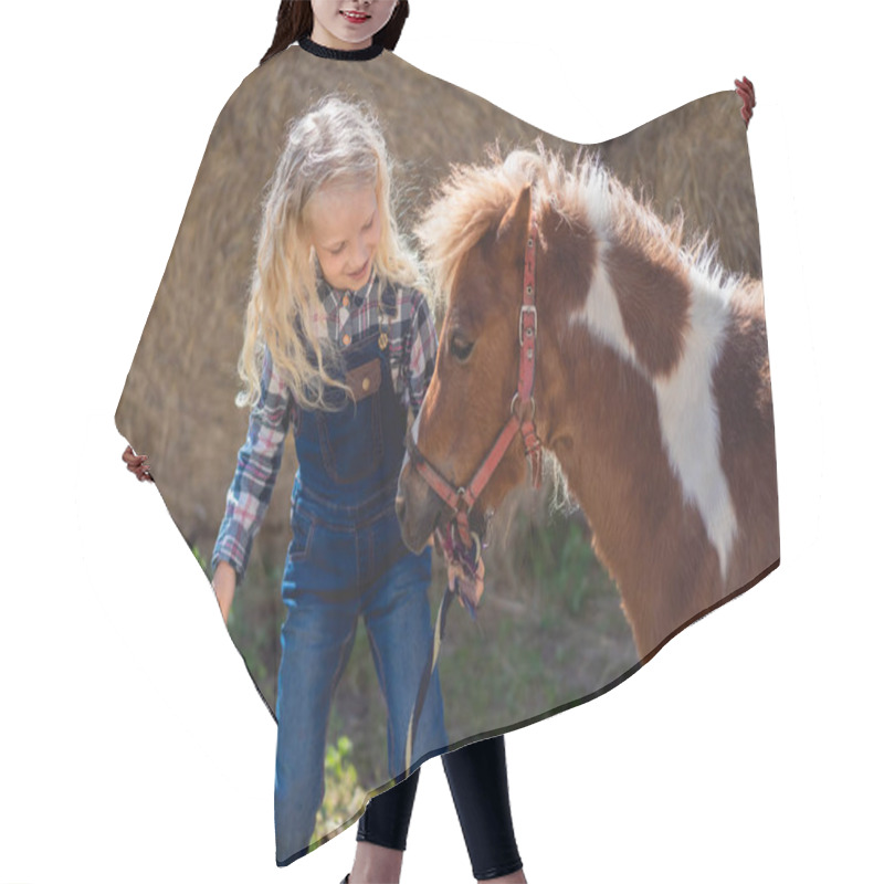 Personality  Happy Kid Standing Near Cute Pony At Farm Hair Cutting Cape