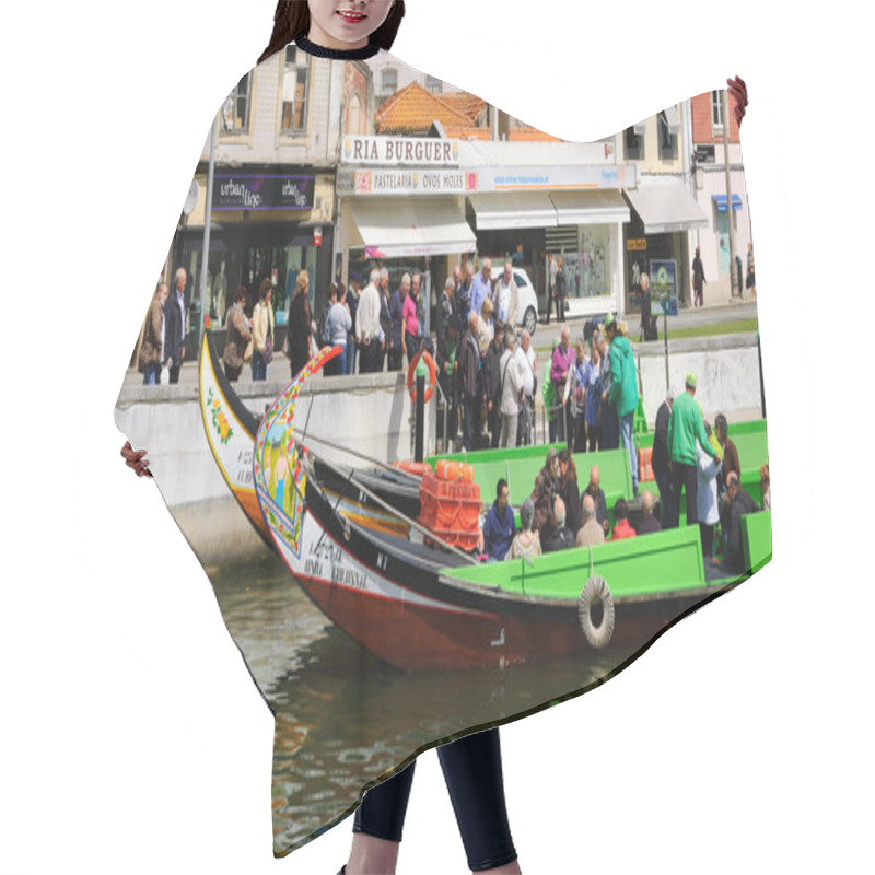 Personality  AVEIRO, PORTUGAL - APRIL 27, 2015: Senior Tourists Take A Cruise In Moliceiro Boats. These Traditional Colorful Half-moon Shaped Boats Depicting Romantic, Religious Historical Or Humorous Scenes. Hair Cutting Cape