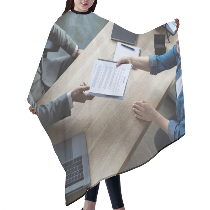 Personality  Overhead View Of Manager And Candidate Holding Resume Near Devices In Office  Hair Cutting Cape