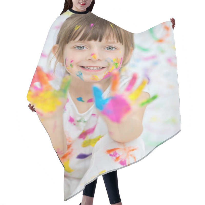 Personality  Portrait Of A Cute Cheerful Happy Little Girl Showing Her Hands Painted In Bright Colors Hair Cutting Cape