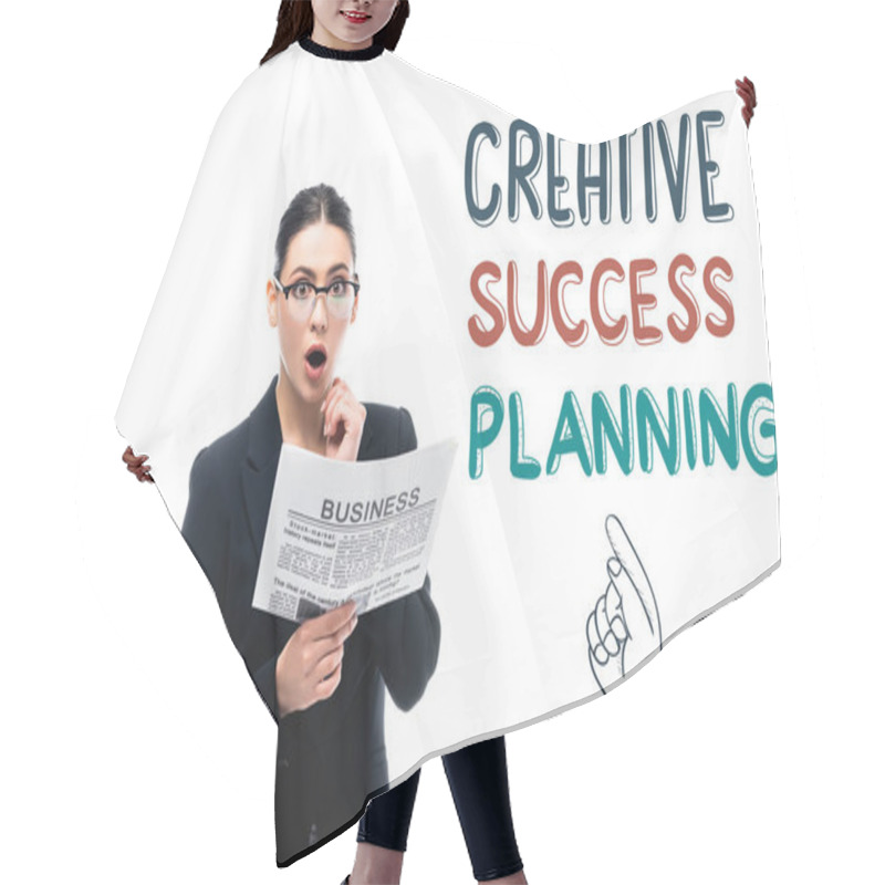 Personality  Surprised Businesswoman Looking At Camera While Holding Newspaper Near Creative Success Planning Lettering And Pointing Hand Isolated On White Hair Cutting Cape