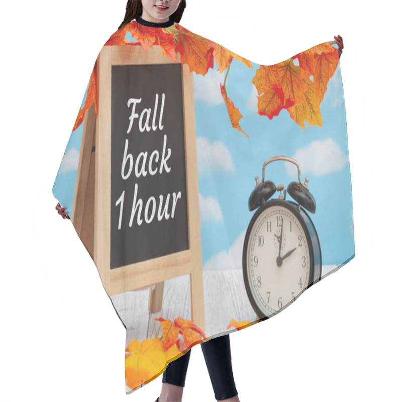 Personality  Daylight Saving Time Fall Back Sign With Alarm Clock And Standing Blackboard On Weathered Wood With Fall Leaves Hair Cutting Cape