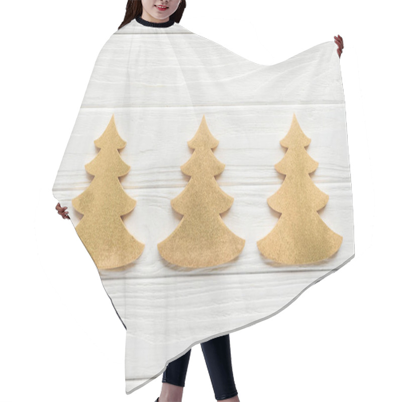 Personality  Top View Of Arranged Decorative Golden Pine Trees On White Wooden Surface Hair Cutting Cape