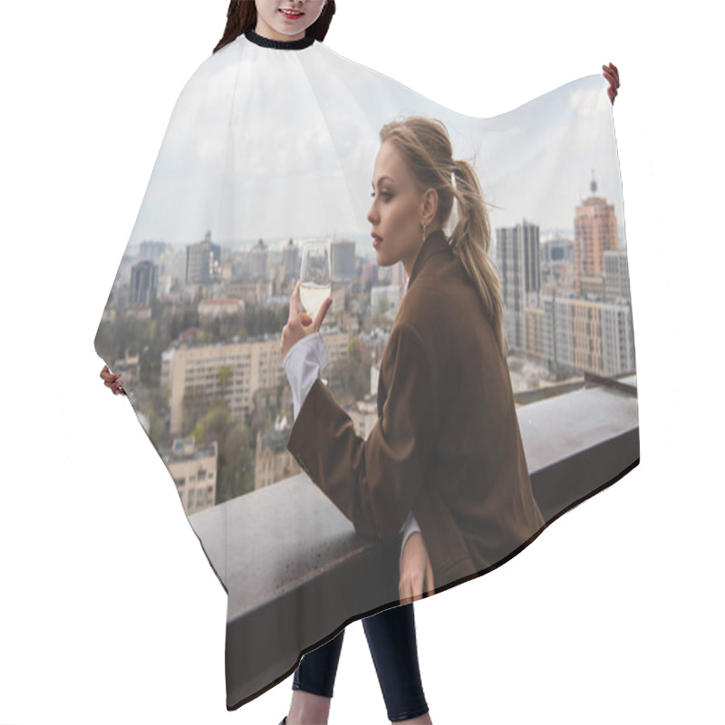 Personality  Young Woman Holding Glass Of White Wine And Posing With Cityscape On Blurred Background Hair Cutting Cape