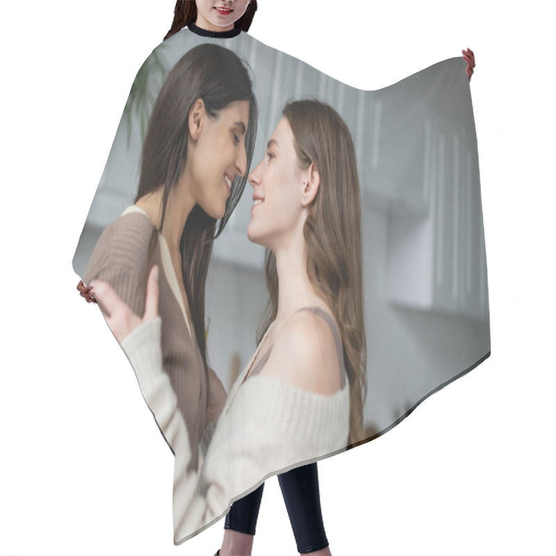 Personality  Side View Of Cheerful Lesbian Women Hugging In Blurred Kitchen  Hair Cutting Cape