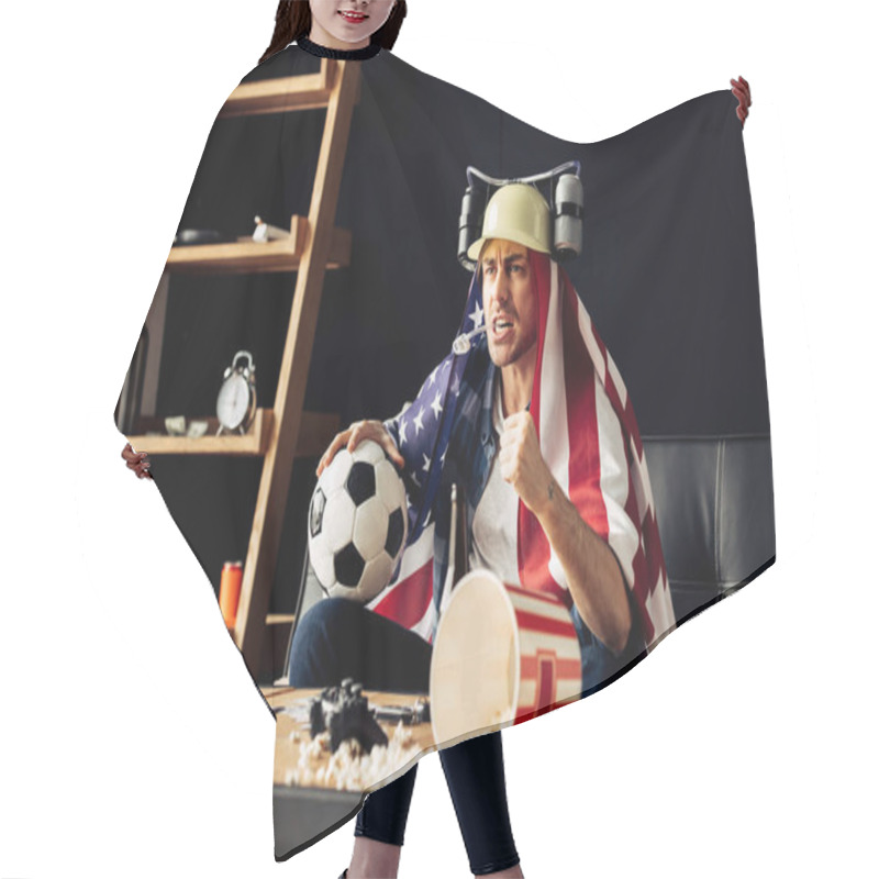 Personality  Man Wearing Beer Helmet Drinking And Holding Ball While Sitting With American Flag On Shoulders And Watching Game Hair Cutting Cape