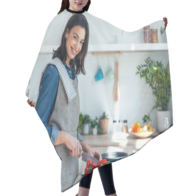 Personality  Shot Of Healthy Young Woman Cutting Fresh Vegetables While Cooking Healthy Food In The Kitchen At Home. Hair Cutting Cape