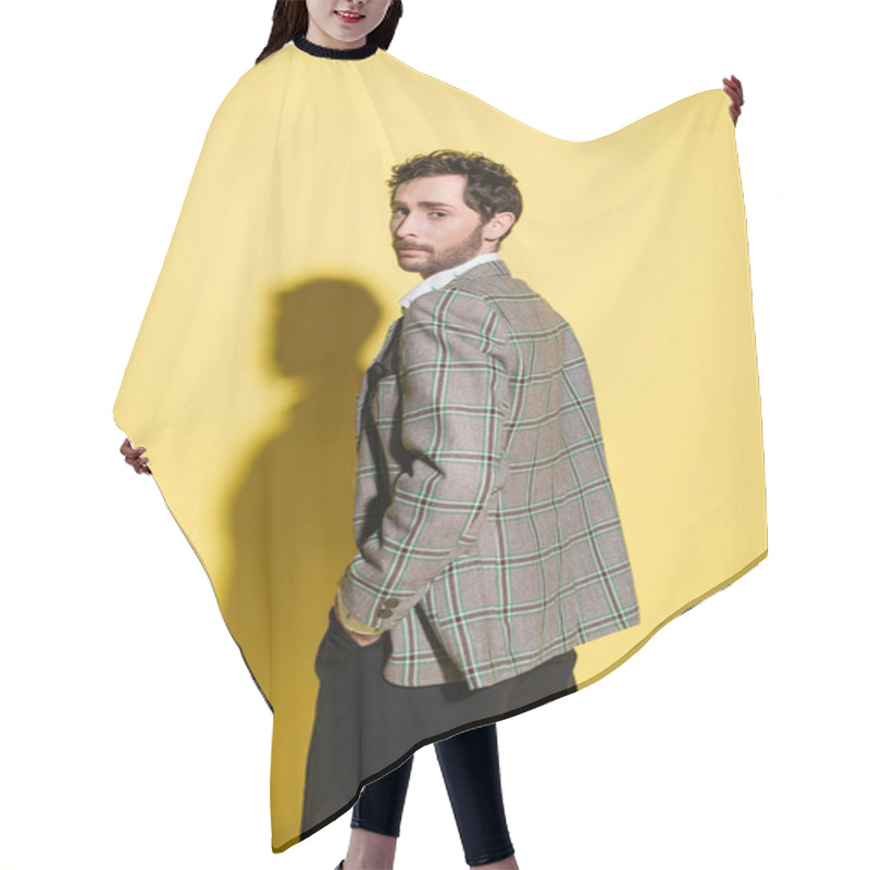 Personality  Trendy Man In Checkered Jacket Looking At Camera On Yellow Background  Hair Cutting Cape