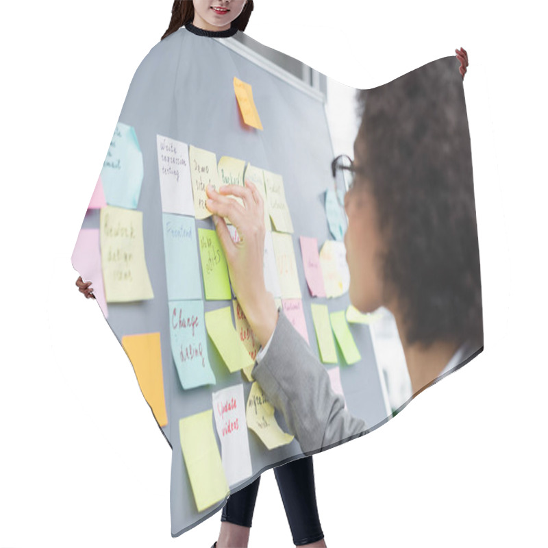 Personality  Blurred African American Manager Working With Sticky Notes On Board Hair Cutting Cape