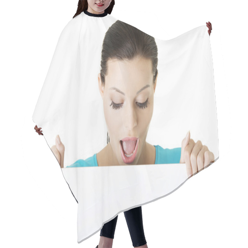 Personality  Shocked woman holding blank board hair cutting cape