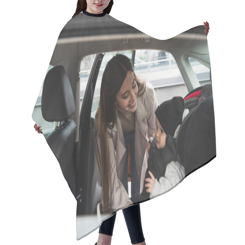 Personality  Joyful Woman Looking At Baby Boy Sitting In Car Seat Hair Cutting Cape