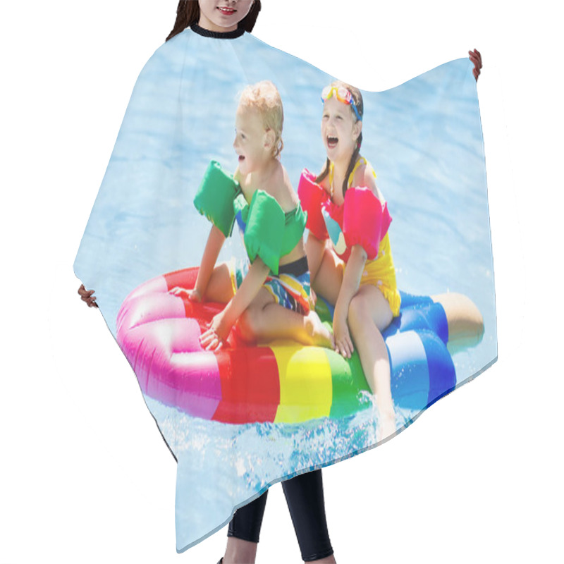 Personality  Kids On Inflatable Float In Swimming Pool.  Hair Cutting Cape