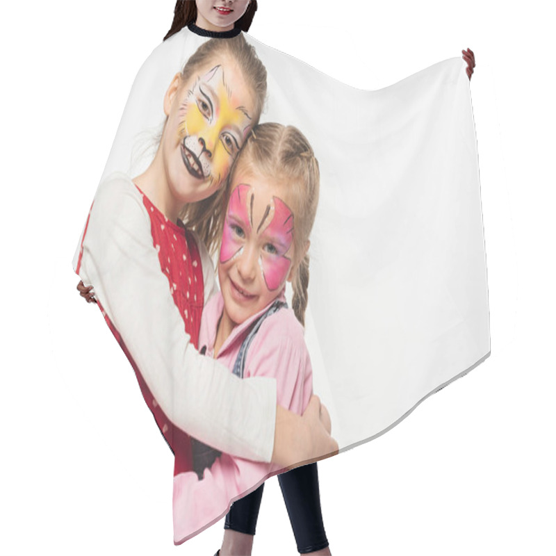 Personality  Cute Children With Cat Muzzle And Butterfly Paintings On Faces Embracing While Looking At Camera Isolated On White Hair Cutting Cape