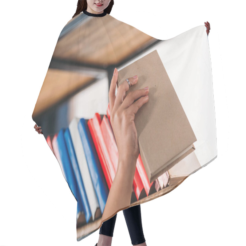 Personality  Cropped Shot Of Student Holding Book At Bookshelf In Library  Hair Cutting Cape