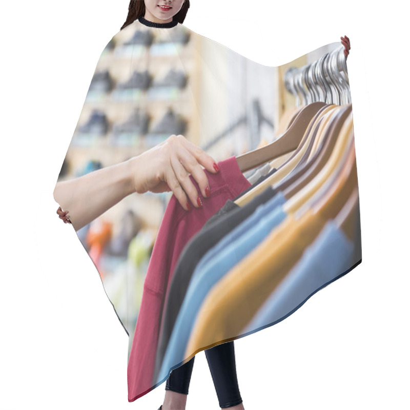 Personality  Row Of Summer Seasonal Apparel And Hand Of Customer In Shop Hair Cutting Cape